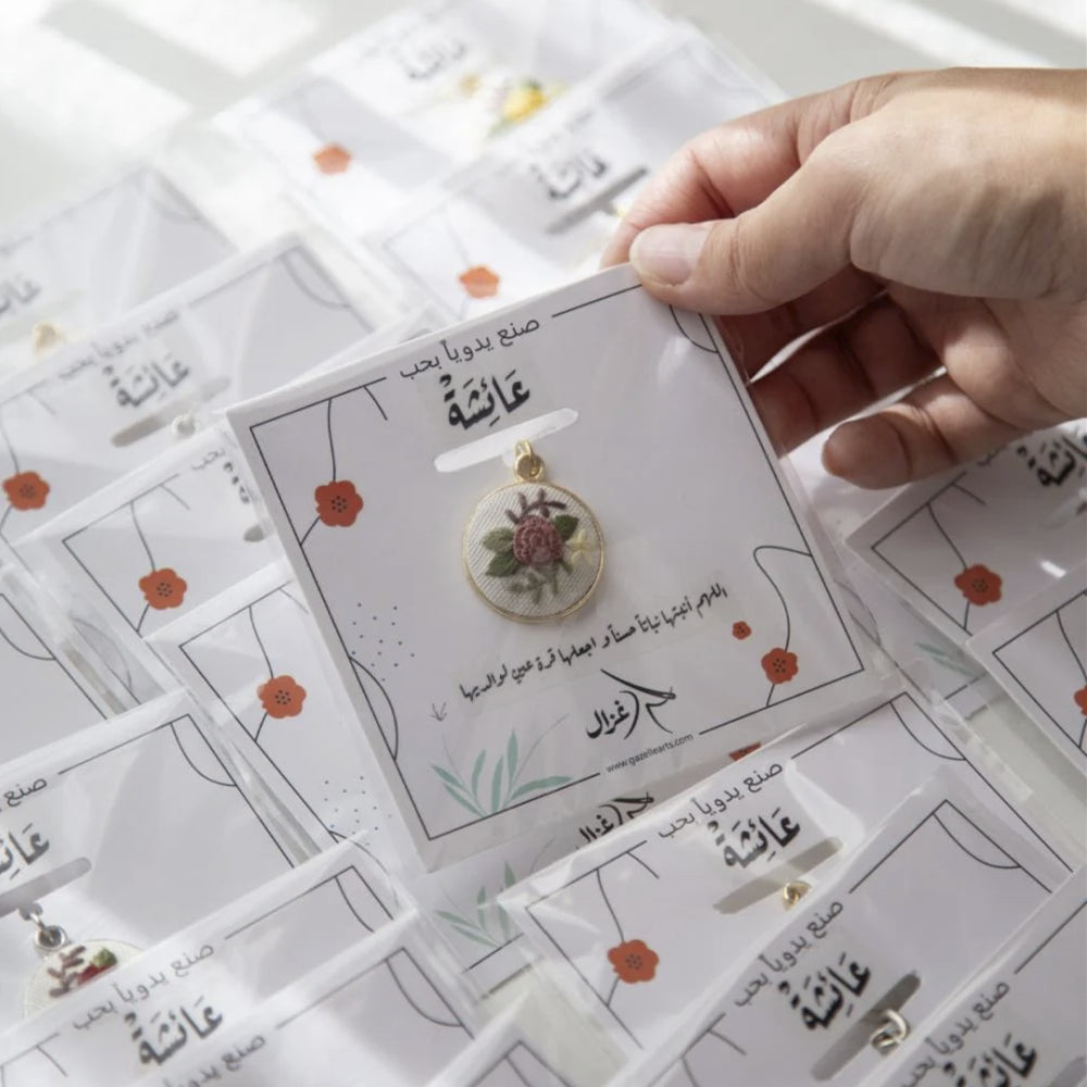 توزيعات ميدالية الوردة الأنيقة